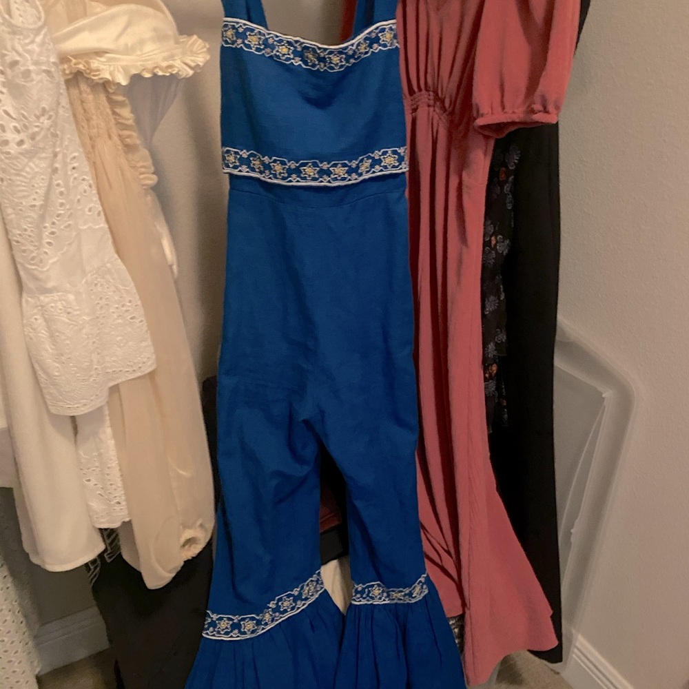 Boho hunter jump suit.